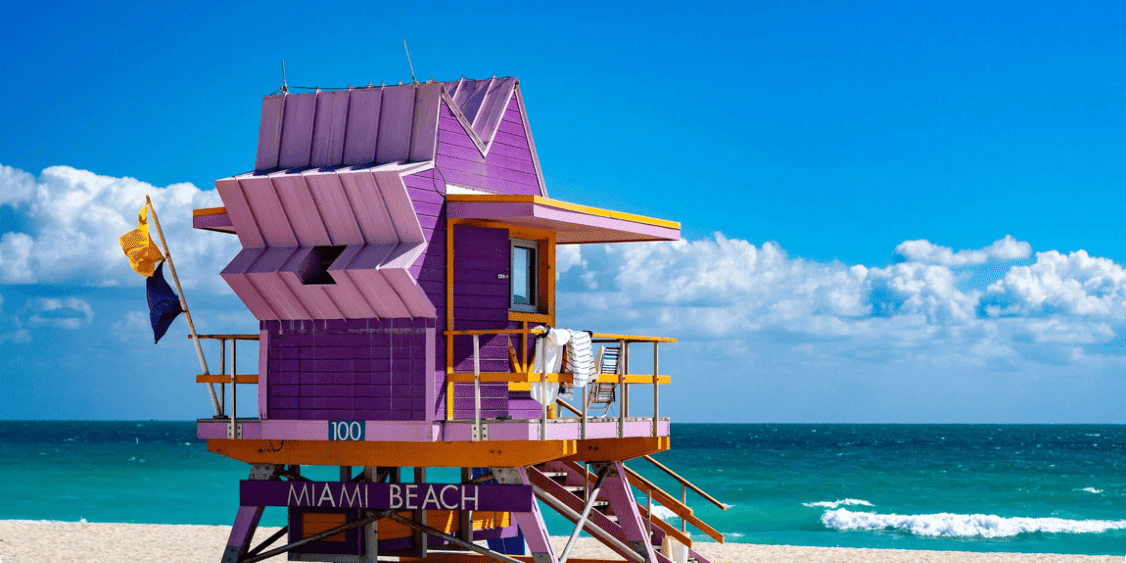 Colorful lifeguard tower on Miami Beach near the Fluenz Spanish Bootcamp location.