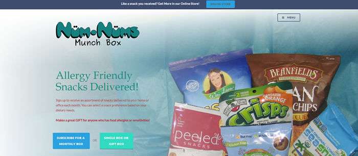 Num-Nums Munch Box website screenshot showing a closeup of various products, like SeaSnax and Peeled Snacks.