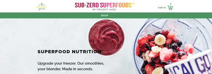 Sub-Zero Superfoods website screenshot showing a blender with frozen fruit and bananas, along with a prepared smoothie.