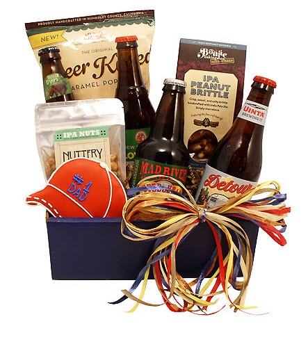 Blue box with 4 bottles of beer, 3 snacks and a #1 Dad sugar cookie.