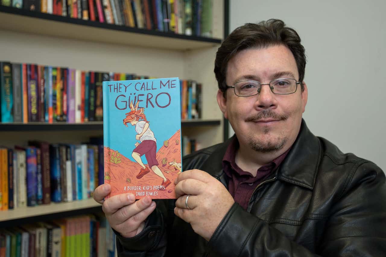 “They Call Me Güero” Novel celebrates Mexican-American culture and youth 1 Featured: Dr. David Bowles, an associate professor in the University of Texas Rio Grande Valley Department of Literatures and Cultural Studies, with his book, “They Call Me Güero”, a novel in verse filled with slice-of-life poems illustrating life as a border kid – something for which 430,000 children in the Valley can relate. Photograph By PAUL CHOUY