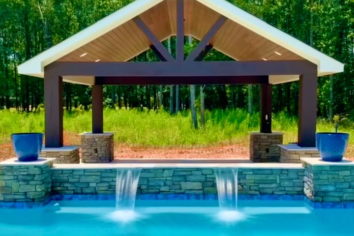 Custom pool with water features that can extend the overall pool construction timeline