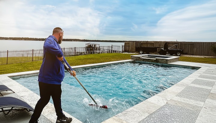 Professional pool cleaning and maintenance ensuring proper water circulation and balance.