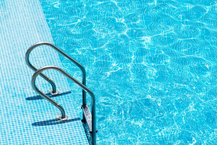 Pool handrail added as part of safety features during the final construction phase