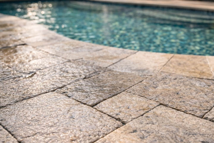 Wet brick pool deck showing texture, durability, and slip resistant character