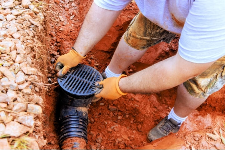 Pool builder installs drain for backyard water control