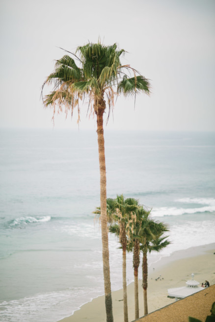 Misty Surf & Sand Resort Wedding – Photo by Let's Frolic Together