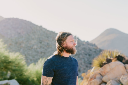A Windy, Romantic Desert Engagement – Photo by Let's Frolic Together
