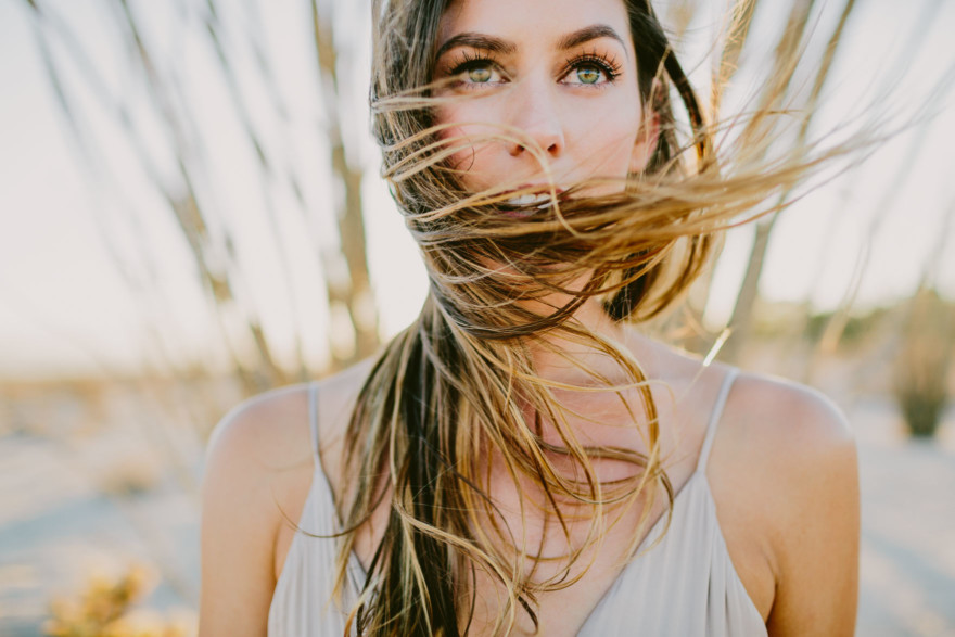 A Windy, Romantic Desert Engagement – Photo by Let's Frolic Together