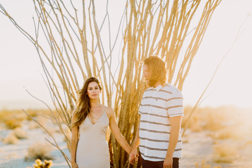 A Windy, Romantic Desert Engagement – Photo by Let's Frolic Together