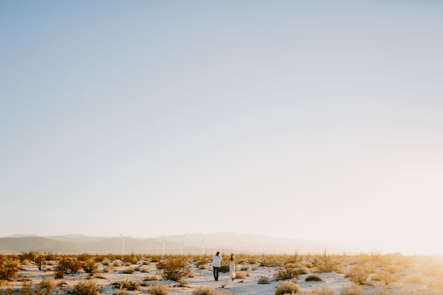 A Windy, Romantic Desert Engagement – Photo by Let's Frolic Together