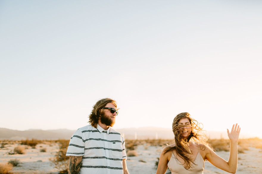 A Windy, Romantic Desert Engagement – Photo by Let's Frolic Together