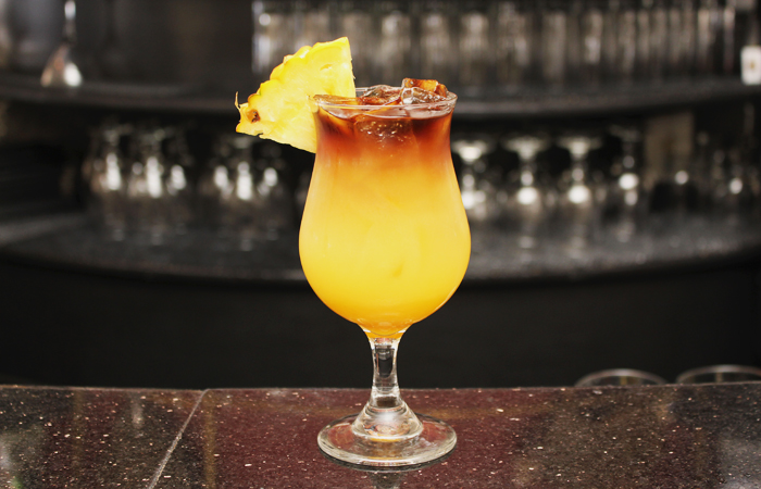 The first drink served is one of only three cocktails carried over from the previous bar menu, the Top of Waikiki. Light and dark rum is mixed with passion fruit puree and pineapple for a sweet cocktail with an acidic kick ($5 during happy hour, $10)