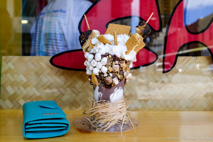 The Mauna Kea Volcano Shake ($15.25) is characterized by toasty marshmallow s'mores and graham crackers. See women's wallet for scale.