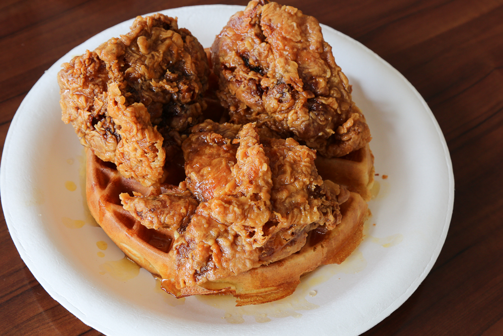 If you're looking for some seriously tasty fried chicken and waffles, look no further than the 3 piece honey butter chicken and waffles meal at Pancakes and Waffles ($11.49). Photo by Grant Shindo