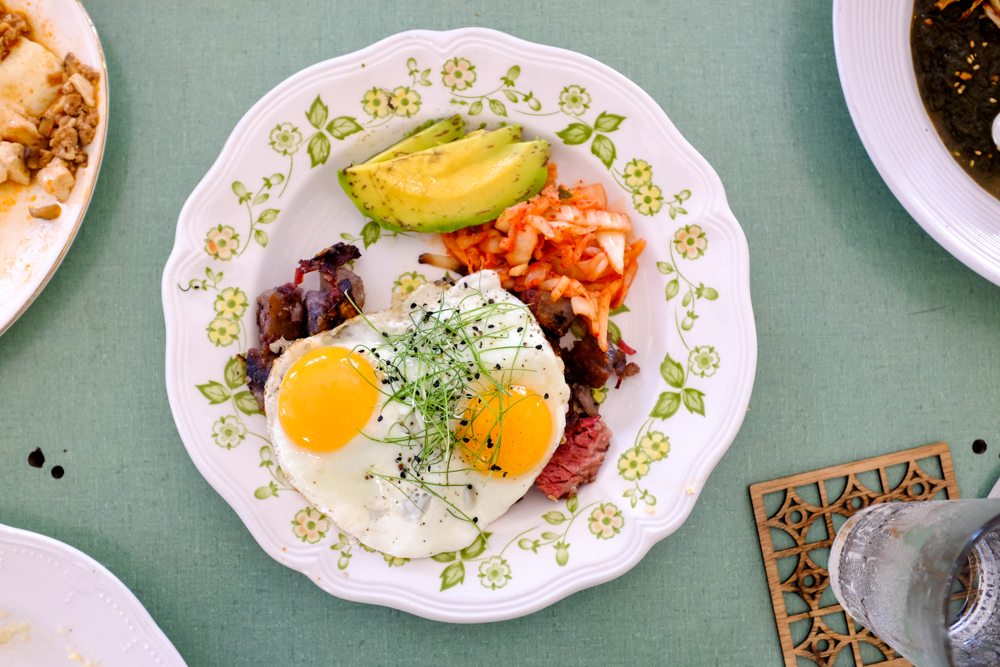 The corned beef and kalo hash ($15) throws all convention aside with house made local corned beef hashed with tender cubes of kalo. The pungent kim chee and creamy avocado tie this texturally pleasing dish together quite well.