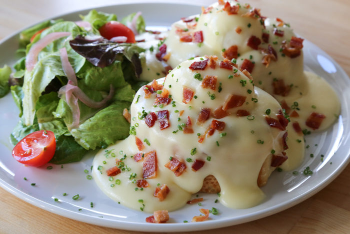 The potato and eggs dish ($13) looks like an eggs benedict and contains the trappings of one but is instead a silky potato puree draped over a soft poached egg on French bread and topped with bacon. Highly recommended.