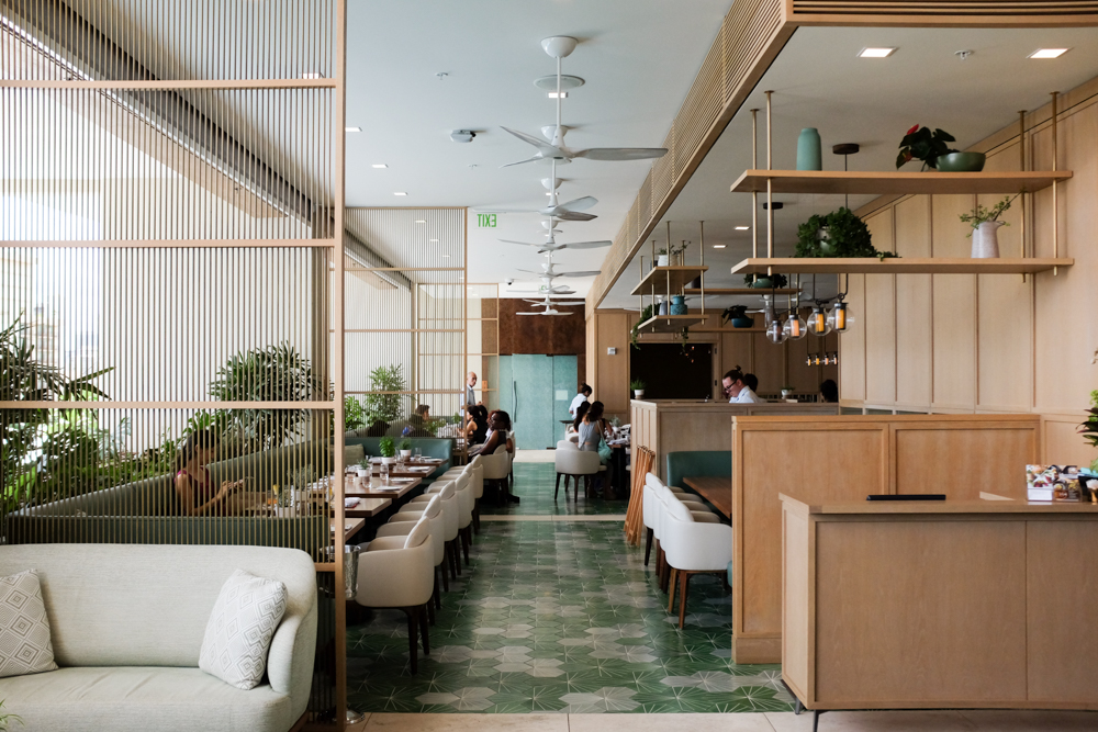 The restaurant is open air and has beautiful natural lighting.