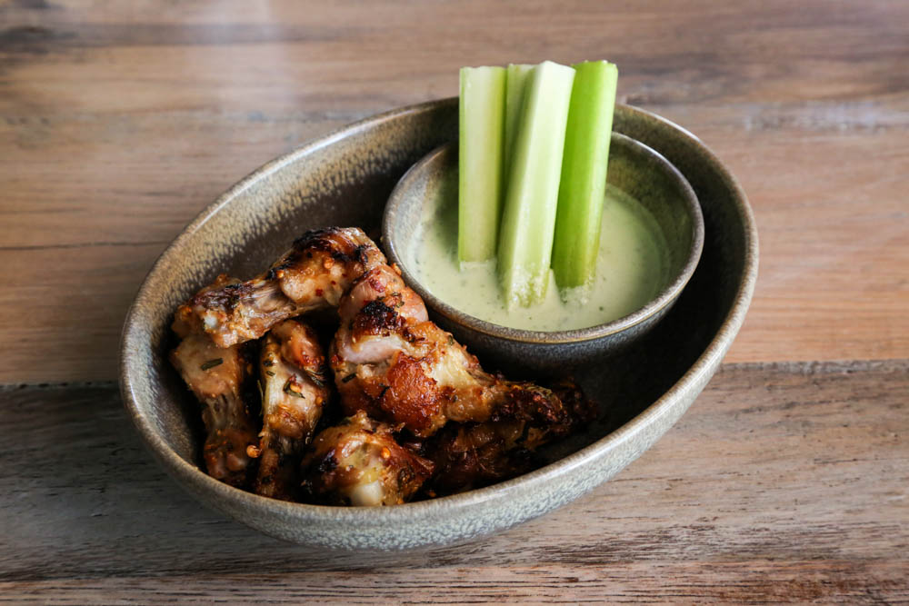 Wood-roasted jidori chicken wings with garlic, rosemary and a cooling tzatziki sauce ($14)