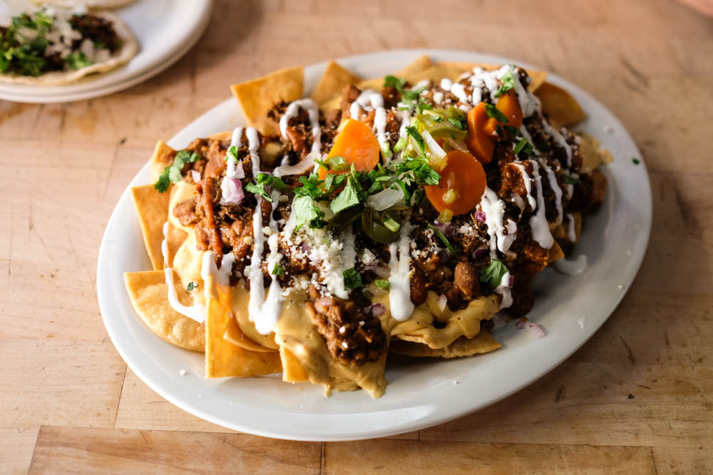 Now that's what I'm talking about. The Grime Time nachos ($12) come stacked with tex-mex queso, beans, cilantro, salsa roja, pickled jalapenos and can be kicked up a notch with pork or chicken ($3) or beef ($3.75).