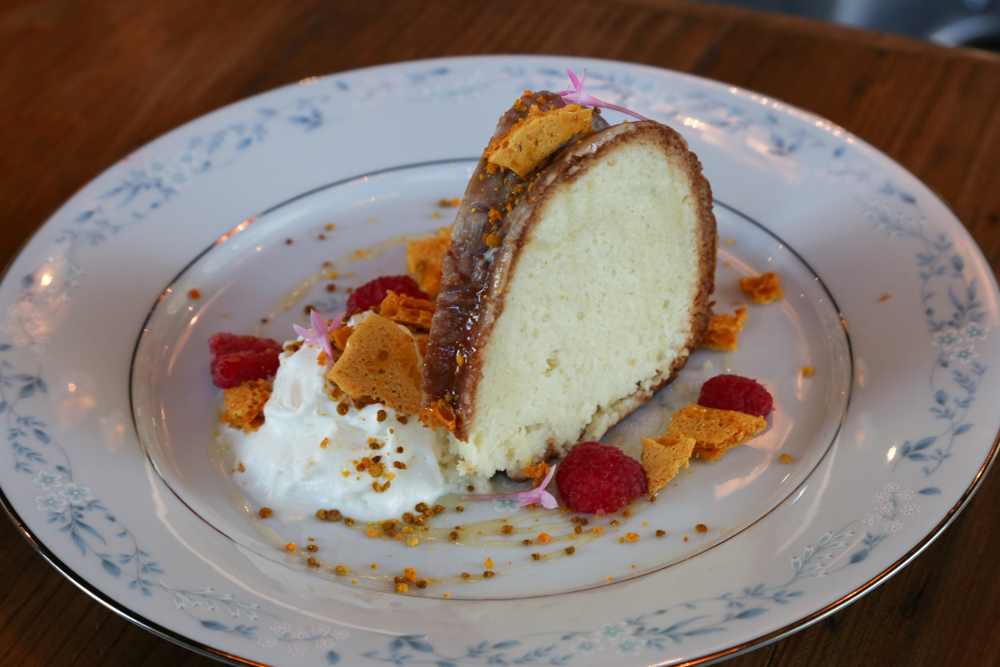 The milk & honey dessert is everything you expect a delicate sponge cake to be and more. This quad leche cake is soaked in four kinds of milk and topped with honey comb candy, local bee pollen, whipped frangelico and edible flowers. It looks unassuming like a bundt cake grandma used to make but is a perfect sweet ending to the meal.
