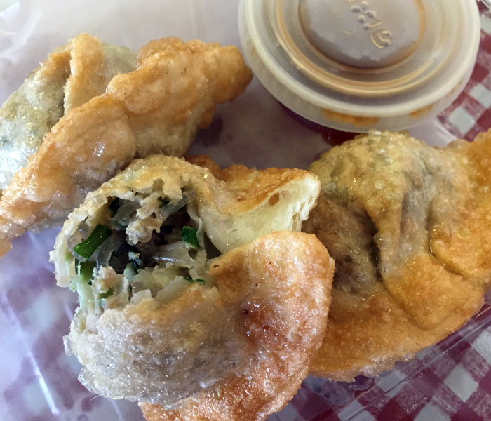 Wait a few minutes before digging into the mandoo. The little wonton-like pieces will probably still be steaming as you chow down on your entrée.