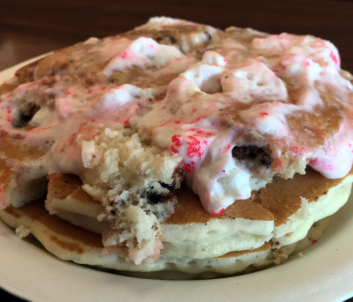 Best way to eat these: spread the whipped cream all over before it dissolves, and dig into the pile while it’s piping hot.
