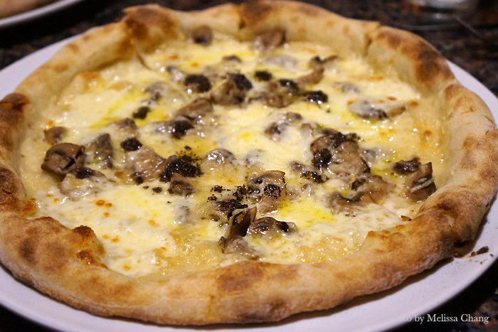 Truffle pizza ($16.95) at Fabiolus has fontina and parmesan cheeses, mushrooms, a specialty black truffle sauce, and then is drizzled with truffle oil.