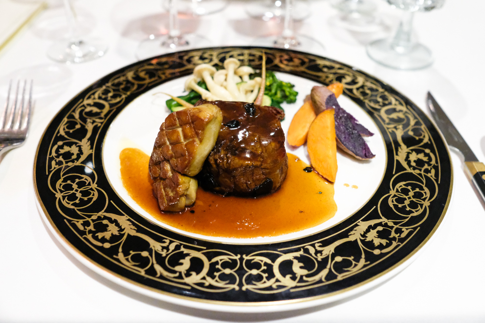 Our entree consisted of a kiawe grilled 7 oz filet mignon and a generous slab of perfectly seared foie gras.