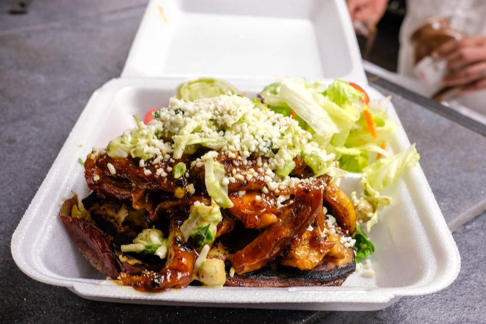 Half of a roasted sweet potato is piled high with slices of barbecue pork, garbanzo marinade and a sprinkling of cotija cheese. For $9.50, there's quite a lot going on, but it totally works.