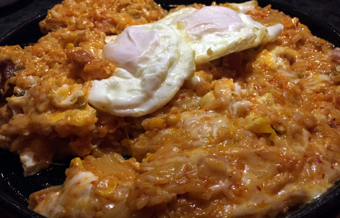 Two eggs are given to us as part of the side dishes. We end up adding them to the fried rice mixture for extra ooze.