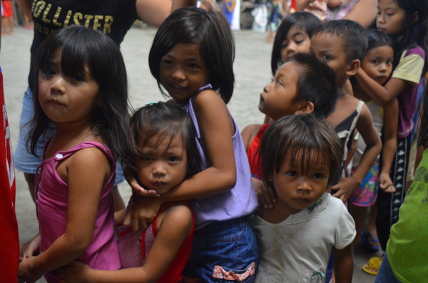Children lining up for food. This picture was taken during the feeding that we did in a slum area in Davao City, Philippines. Children lining up for food. This picture was taken during the feeding that we did in a slum area in Davao City, Philippines.