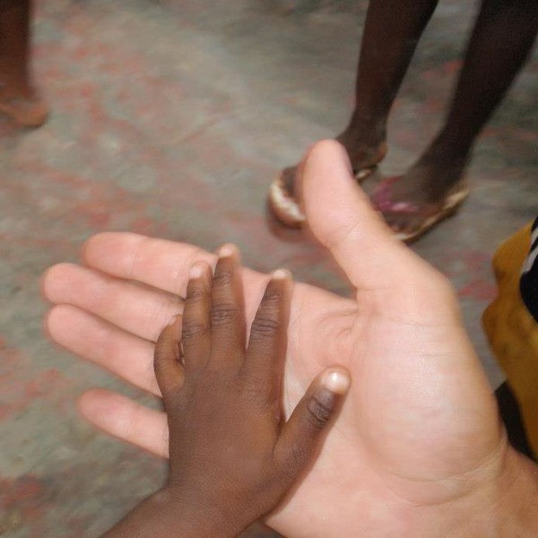 Kevin's hand in hand with Gladin, one of the many orphans he touched not only with his hands but with his heart, love of Christ and Purity. Kevin's hand in hand with Gladin, one of the many orphans he touched not only with his hands but with his heart, love of Christ and Purity.