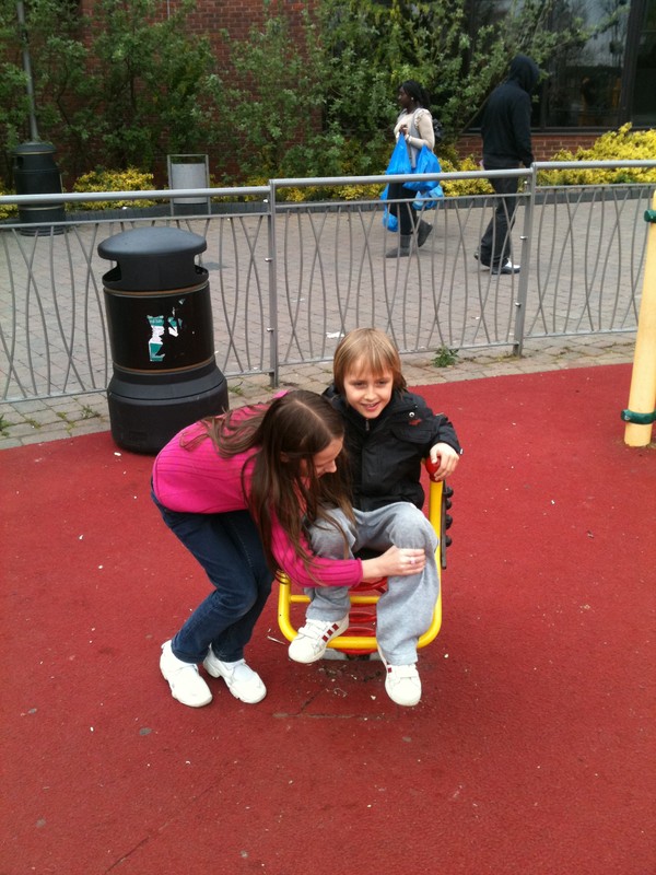 Sister helping Aronas climb in Sister helping Aronas climb in