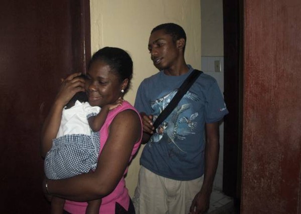 Jennie and Waddy with a baby resident Jennie and Waddy with a baby resident