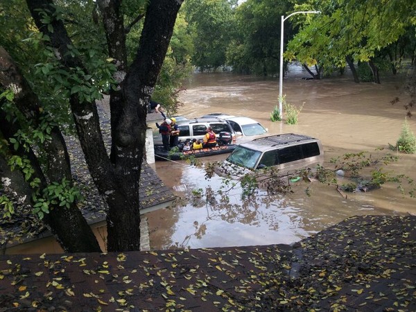Liz's Daughter-n-law and grand daughter being rescued. Liz's Daughter-n-law and grand daughter being rescued.