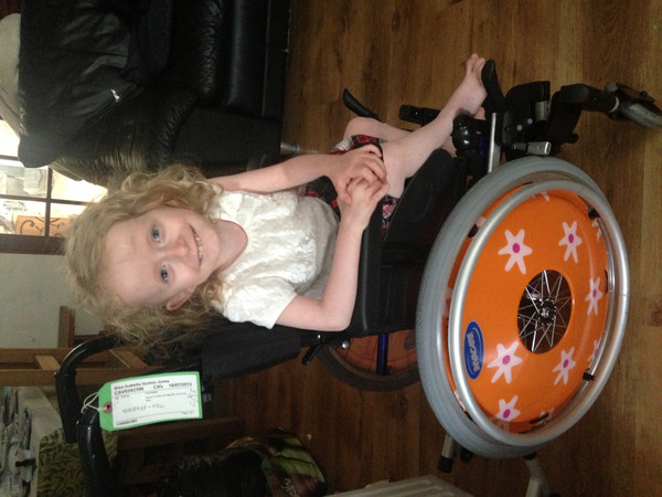 Isabella in her new wheelchair Isabella in her new wheelchair