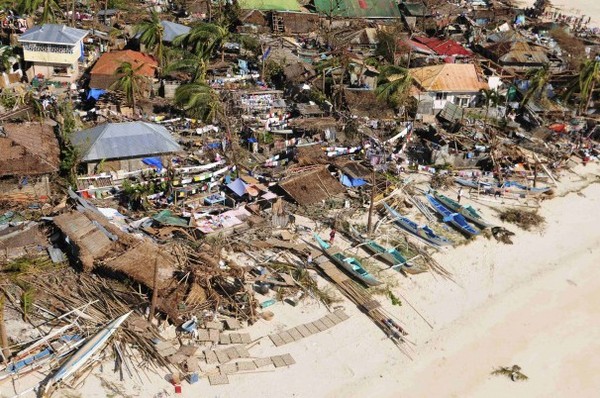 An aerial view shows damaged houses on a coastal community after Typhoon Haiyan hit Iloilo province in the central Philippines. (Raul Banias for Reuters) An aerial view shows damaged houses on a coastal community after Typhoon Haiyan hit Iloilo province in the central Philippines. (Raul Banias for Reuters)