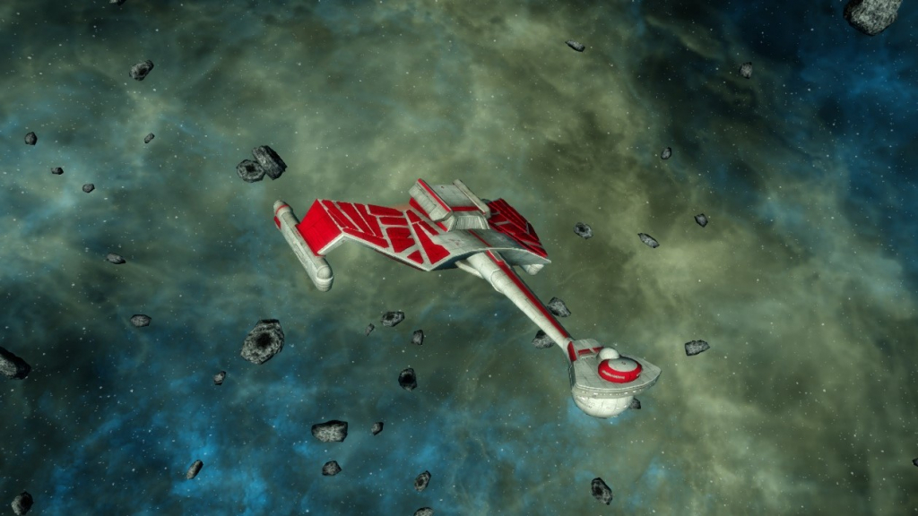 Formerly IKS AGONY, which was transferred to the Romulan Empire under the terms of the Klingon-Romulan Non-Aggression Pact of 2267, and renamed as IRW VRENEK. It later was recovered from a mothball shipyard after having survived the destruction of the Romulus system and reactivated by the Romulan Republic as RRW VRENEK.