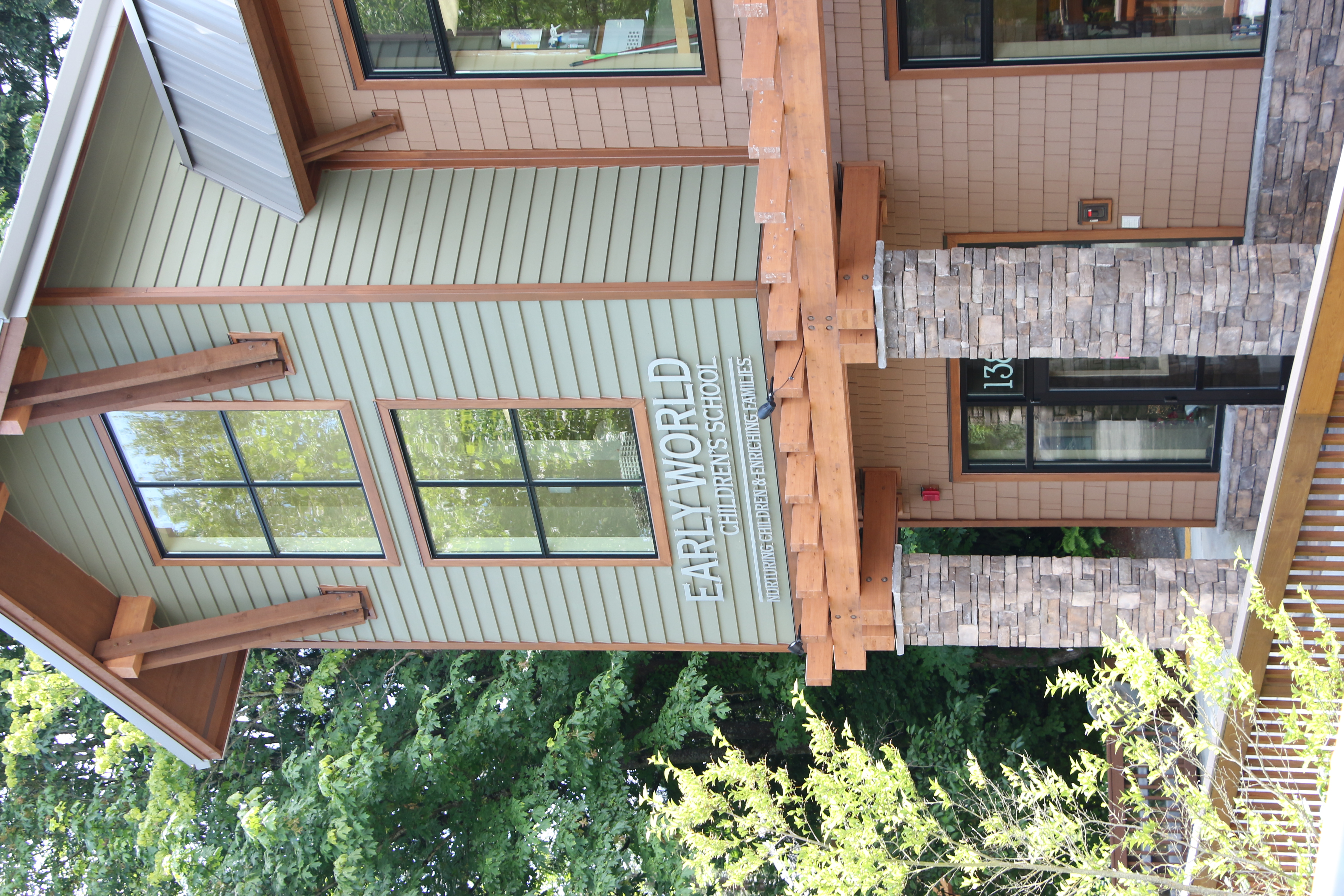 Early World Children's School Logo