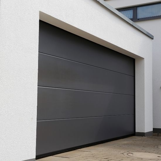 Why is my garage door vibrating during operation?