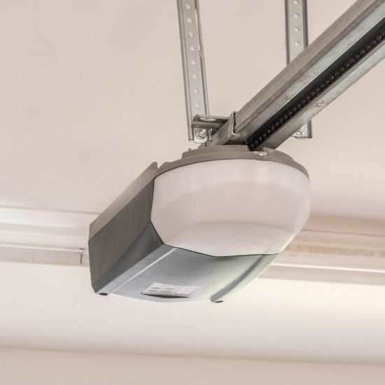 What causes garage doors to become misaligned?