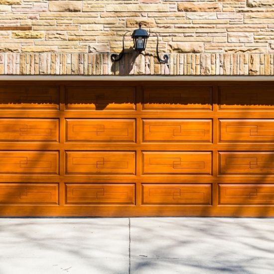 How often should garage doors be serviced?