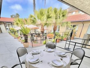 The outdoor dining area at Pacific Palms