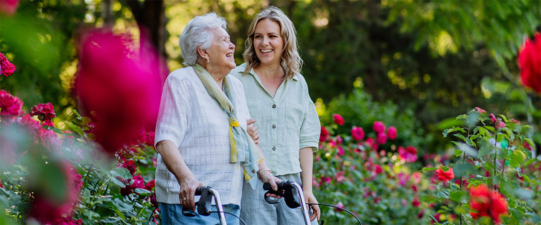 two women in a garden