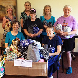 elderly group smiling together