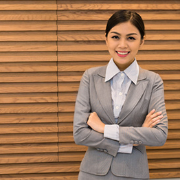 smiling female professional dressed in a business suit
