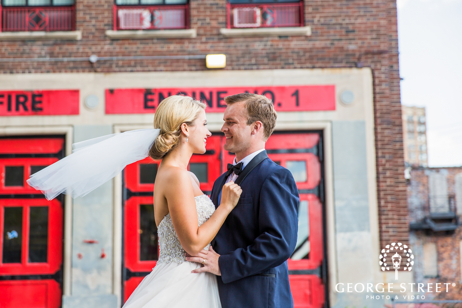 firestation bride and groom wedding portrait