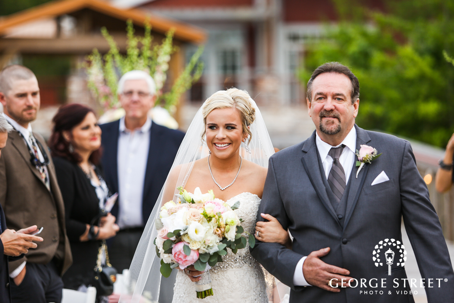 father walking bride down the aisle