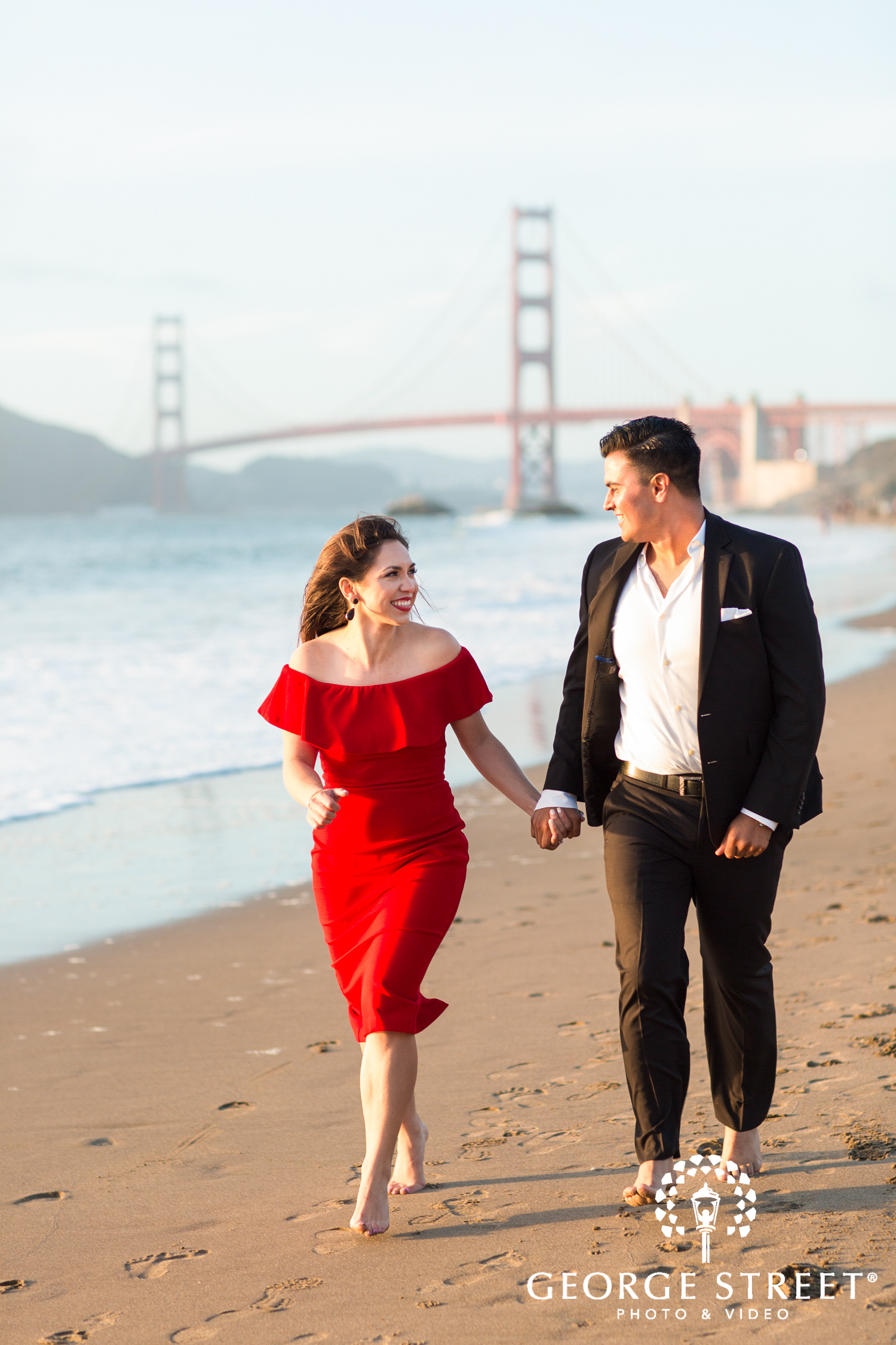 cheerful beach engagement photography golden gate bridge